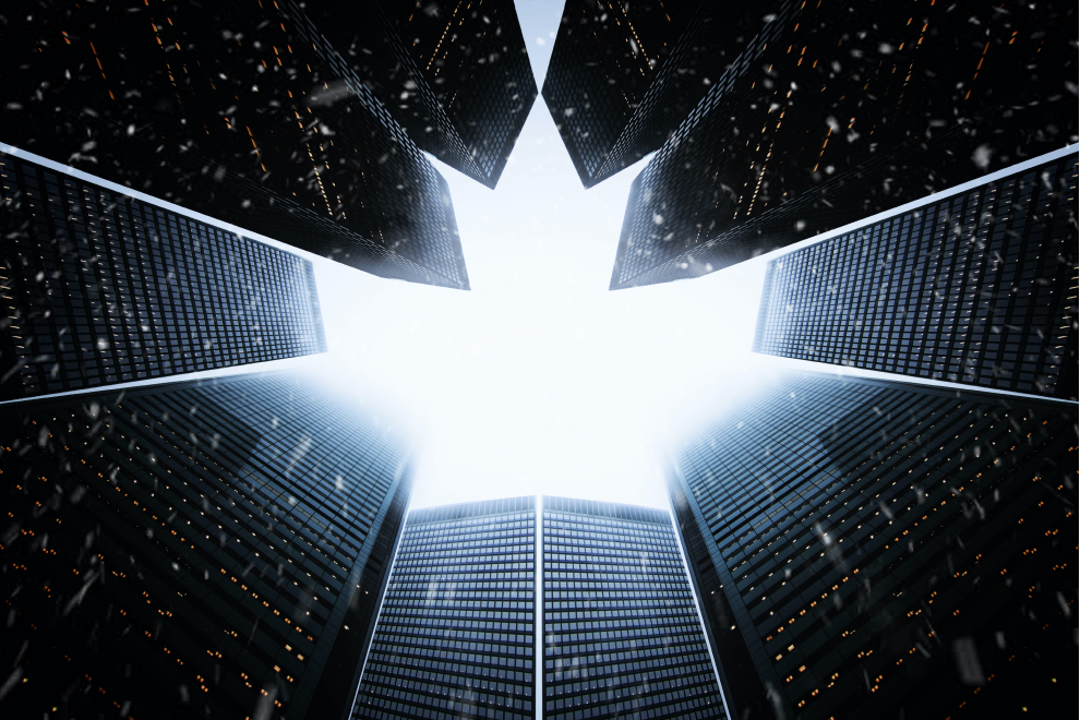 An upward view of skyscrapers whose rooflines form a maple leaf