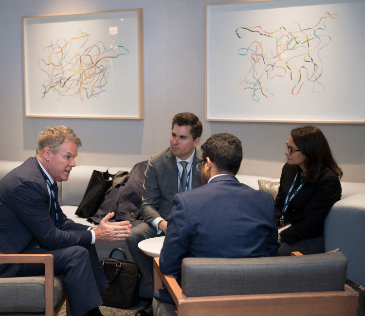 A group of business people having a round table discussion